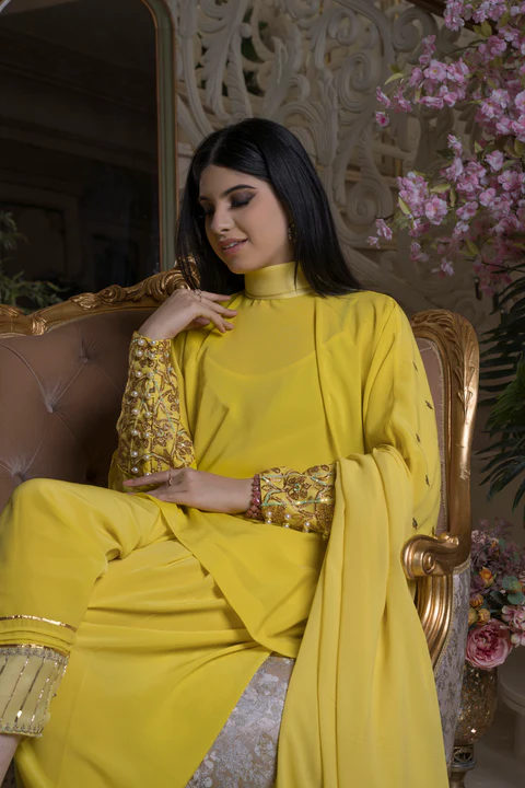 Yellow high-neck French crepe kurti with hand-embroidered sleeves, back and salwar, with pure chiffon dupatta